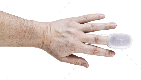 pulse oximeter on male finger tip isolated