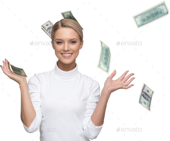 a woman throwing money in the air with her hands