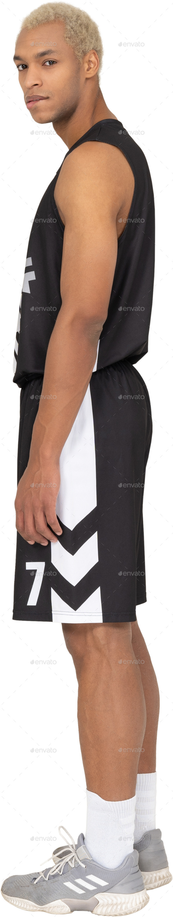 a man wearing black and white shorts and white socks Stock Photo by Icons8