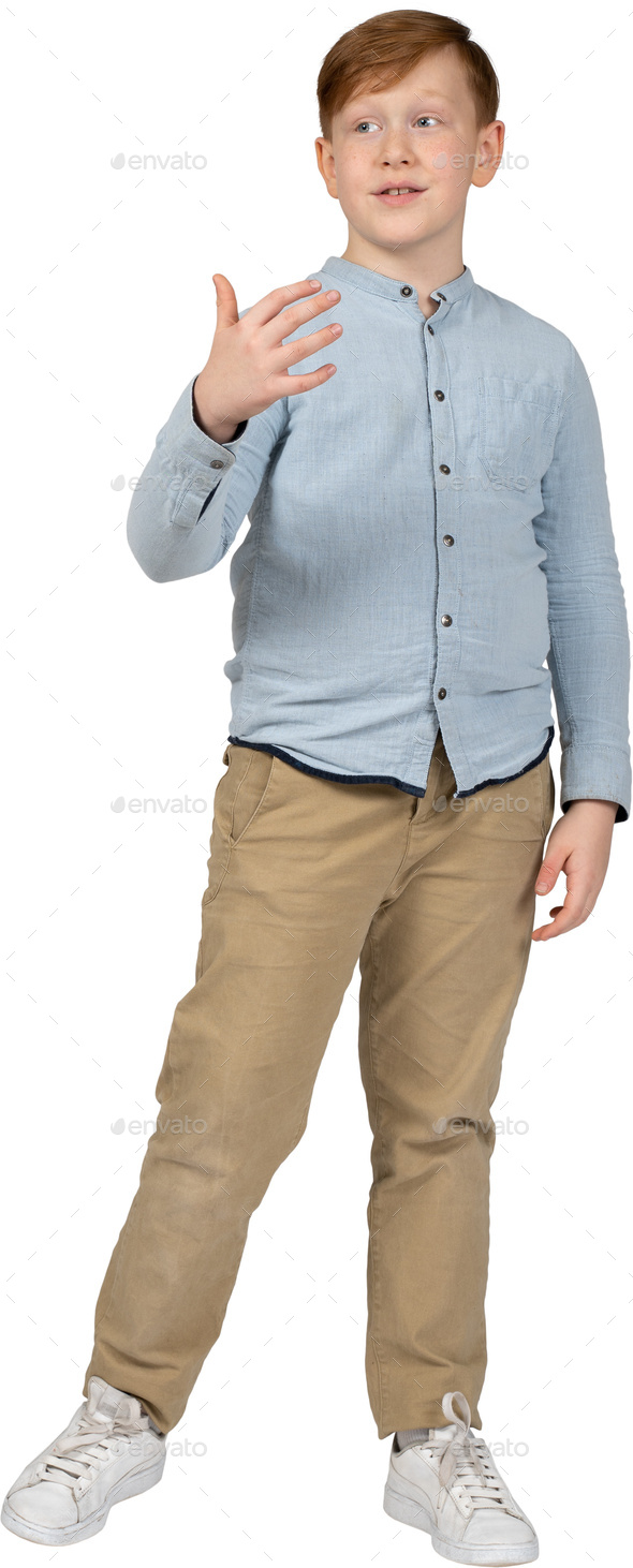 a young boy wearing a blue shirt and khaki pants Stock Photo by Icons8