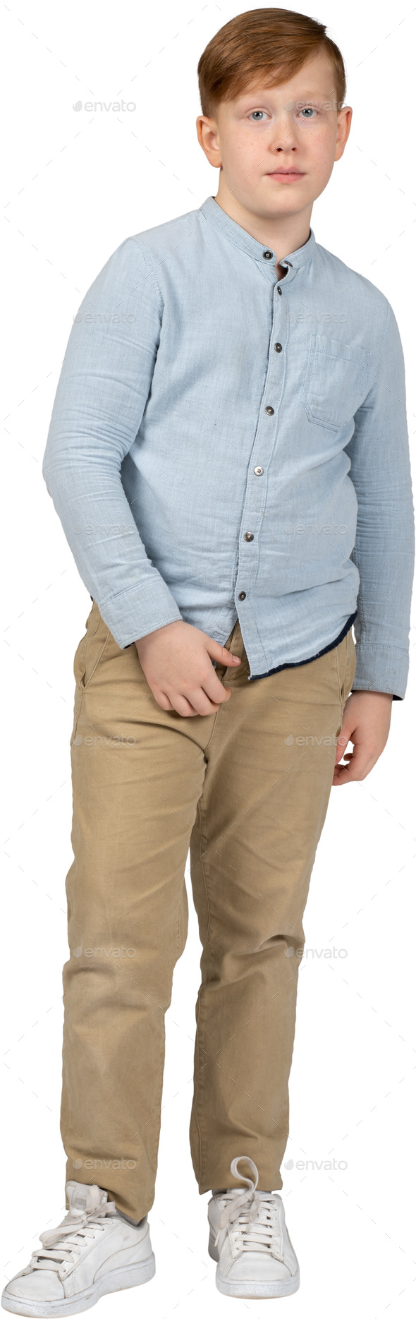 a young boy wearing a blue shirt and khaki pants Stock Photo by Icons8