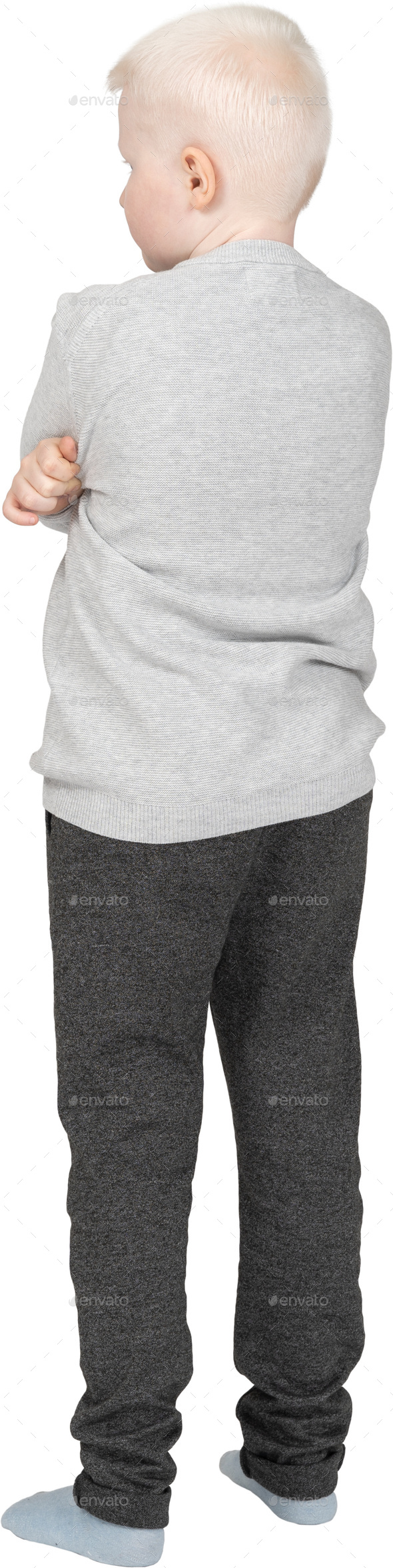 a baby wearing a gray sweatshirt and black pants