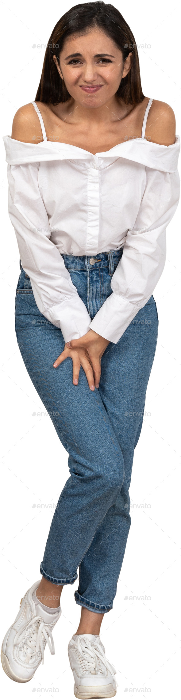 a woman wearing blue jeans and a white off the shoulder shirt
