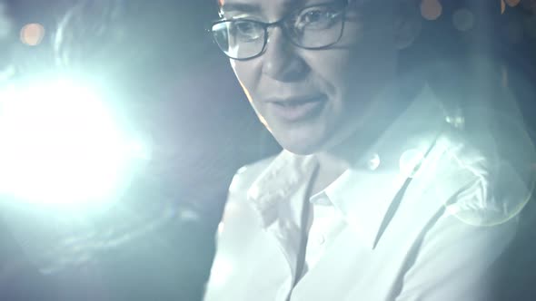 Female Boss Speaking to Employees in Dark Office alt