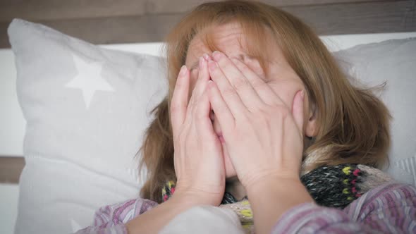 Sick Woman in Bed
