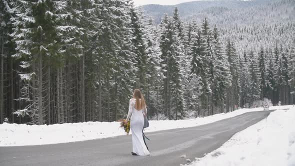 Couple Walking in the Winter Forest alt