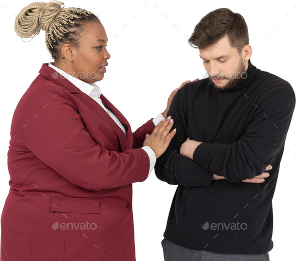 A Man And A Woman Standing Next To Each Other With Their Arms Crossed Stock Photo By Icons