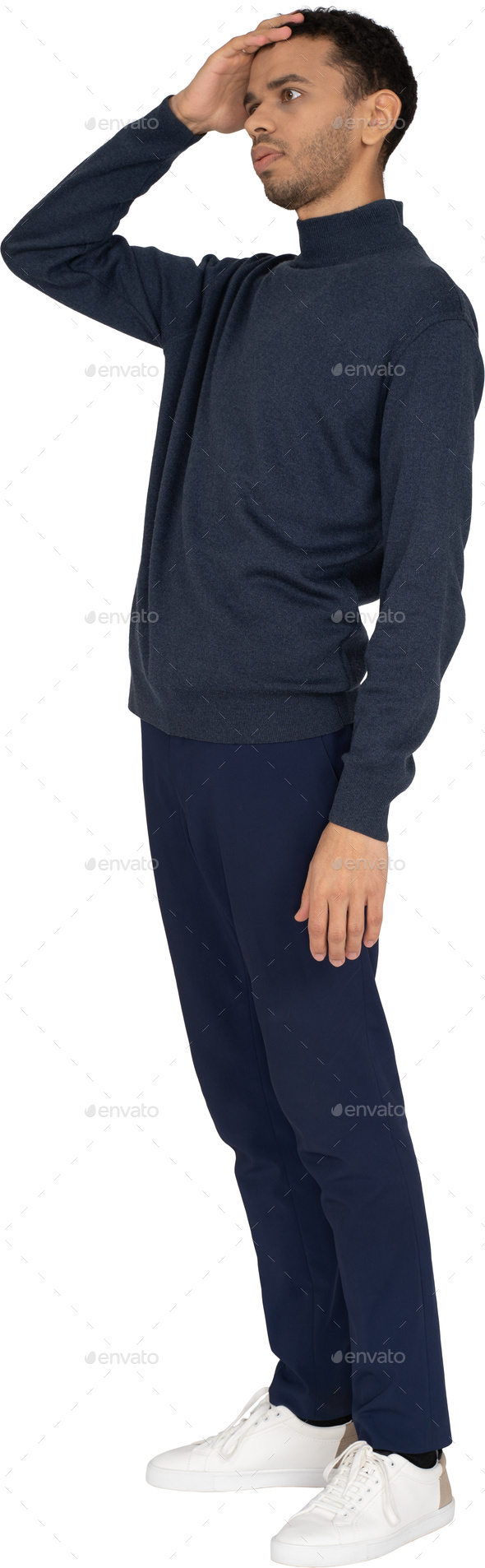 a man wearing a navy blue sweatshirt and navy blue pants