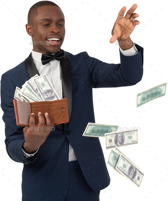 a man in a suit and bow tie throwing money out of a wallet