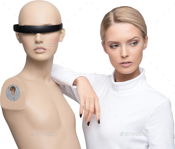 a mannequin with a head wearable device and a woman with a white shirt