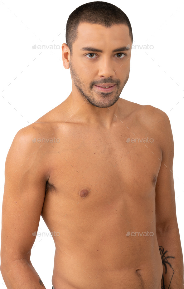 a man with no shirt on and a tattoo on his chest