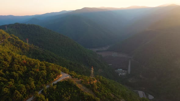 Aerial Panoramic Landscape of Mountains at Sunset alt