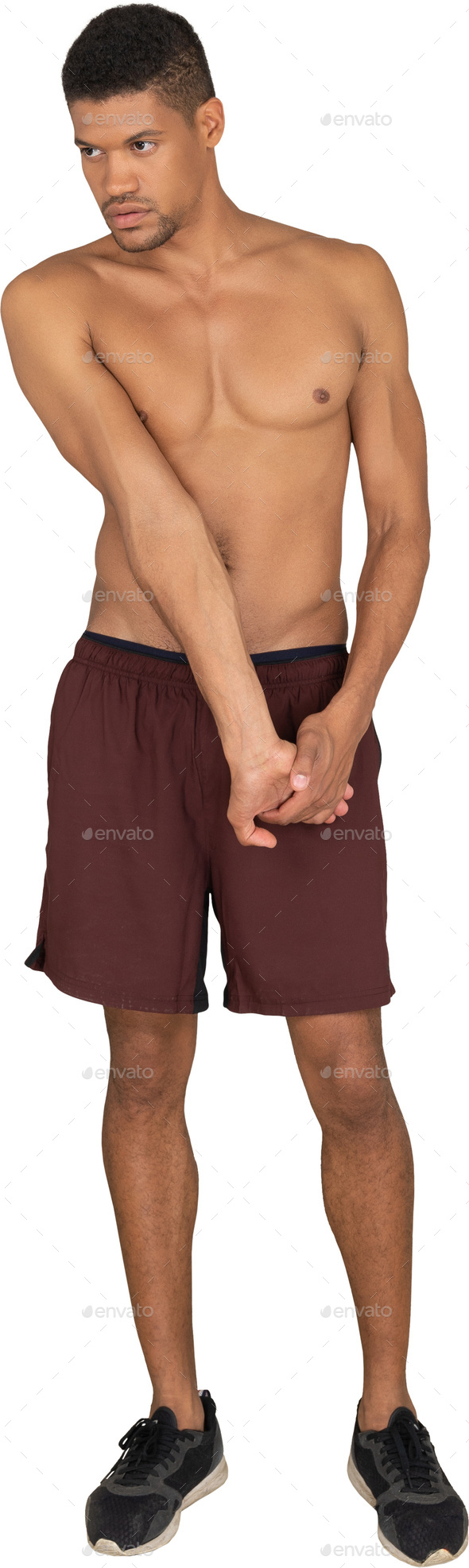 a man is standing with his hands on his waist
