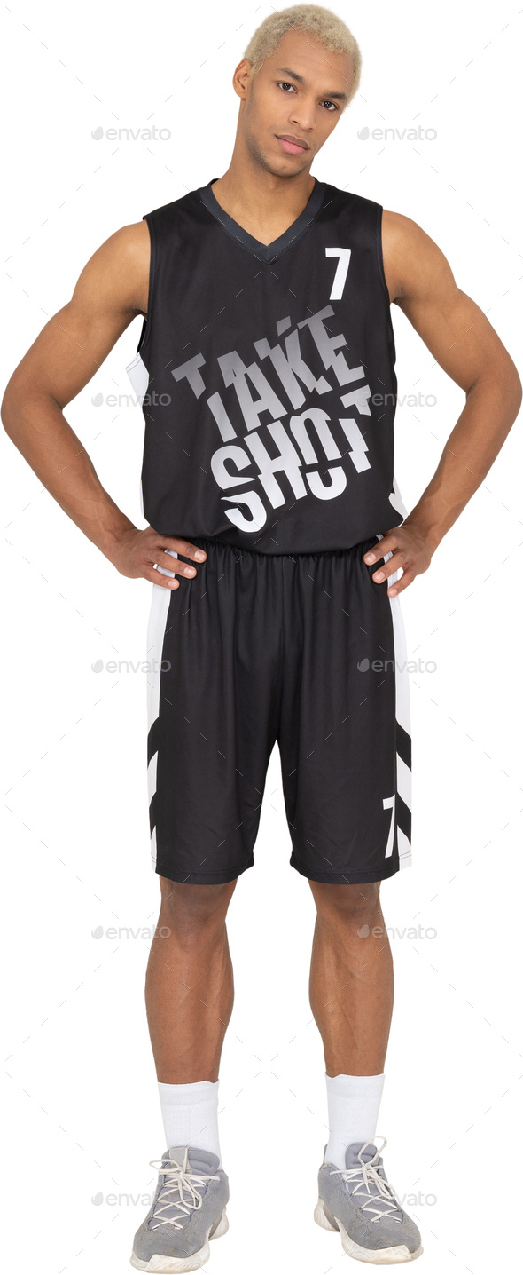 a man wearing a black tank top and basketball shorts
