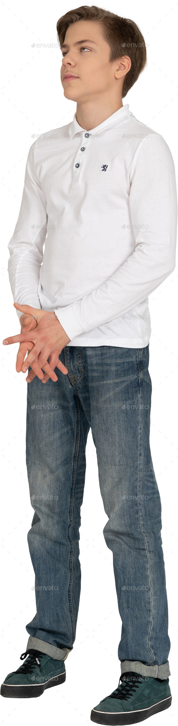 a woman in a white shirt and blue jeans is posing for a picture Stock