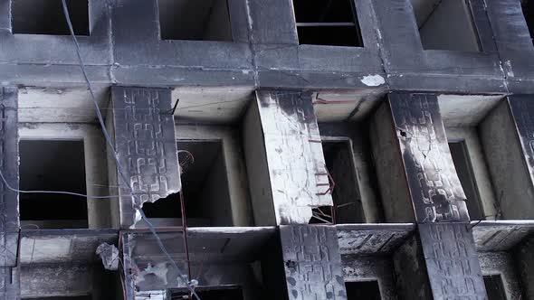 Vertical Video of Civilian Cars Destroyed During the War in Ukraine alt