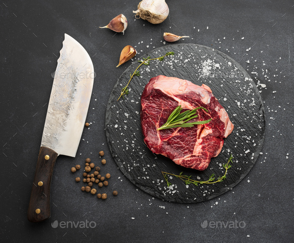 Thyme and Table Knives Cutting Meat