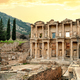 Facade of Library of Celsus in Ephesus under yellow sky - PhotoDune Item for Sale