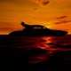 Sunset at Sea and Yacht Moving Fast - VideoHive Item for Sale