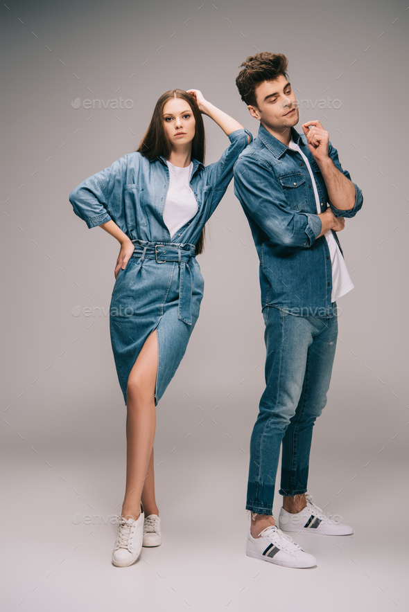 Girlfriend in Denim Dress with Crossed Arms and Smiling Boyfriend in Jeans  and Shirt Hugging and Looking at Camera Stock Photo - Image of footwear,  couple: 177252046