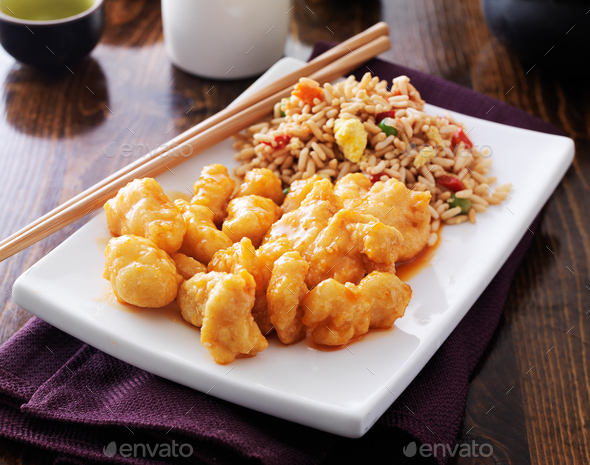 orange chinese chicken with fried rice Stock Photo by joshua_resnick