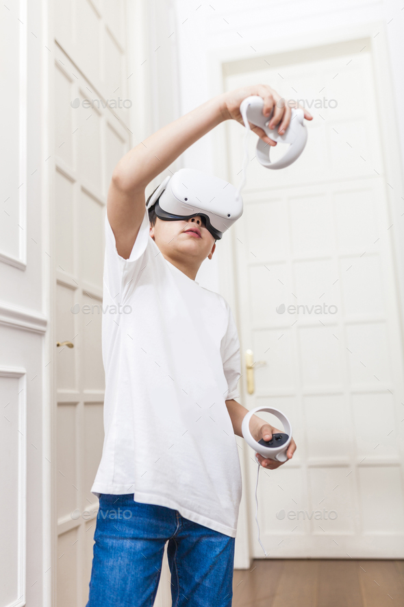Young boy playing with virtual reality