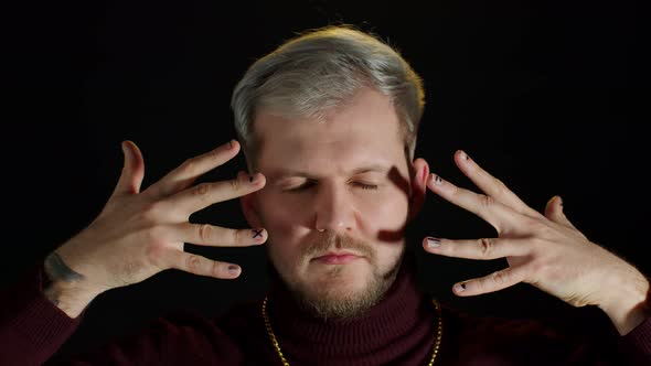 Stylish Young Man with Blue Eyes Looking at Camera Posing Feeling Happiness Fun Enjoyment alt