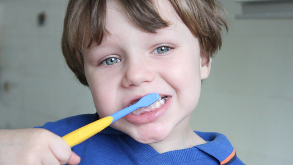 Boy Brushing His Teeth