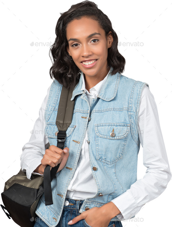 a woman wearing a denim jacket and a sling bag