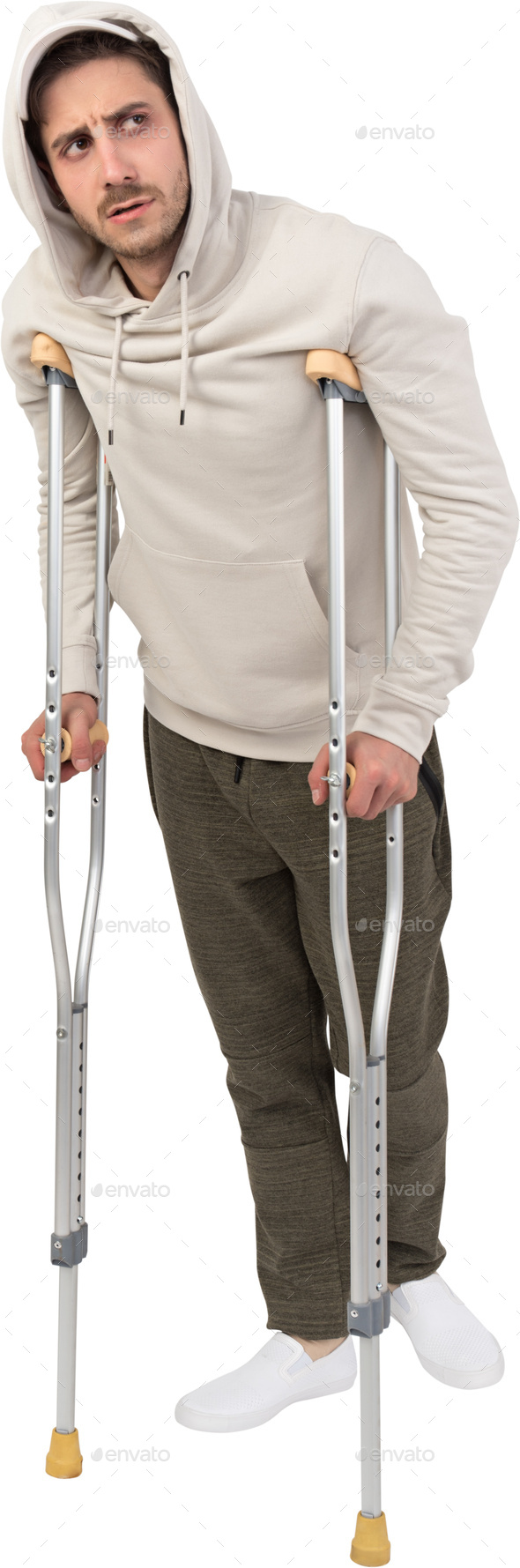 a man standing on crutches with his injured legs Stock Photo by Icons8