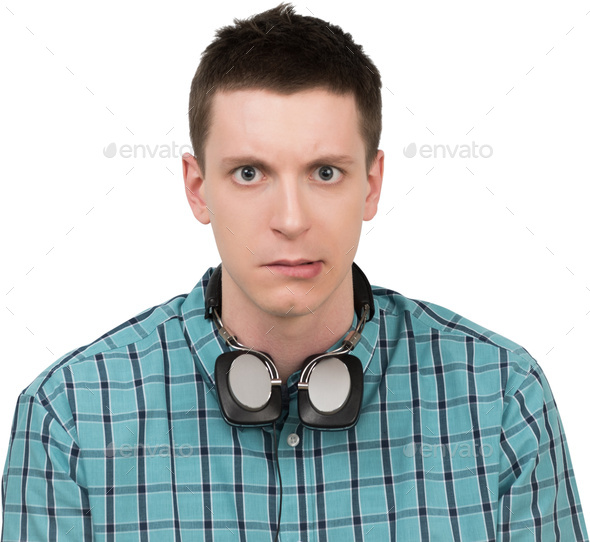 a young man with headphones around his neck