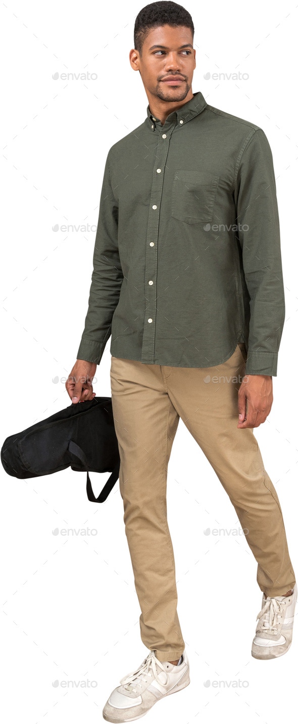a man holding a bag and wearing khaki pants and a green shirt Stock Photo  by Icons8