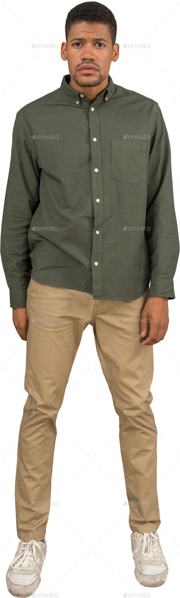 a man wearing khaki pants and a green shirt and white shoes Stock Photo by  Icons8