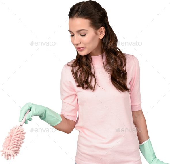 a young woman holding a pink feather brush