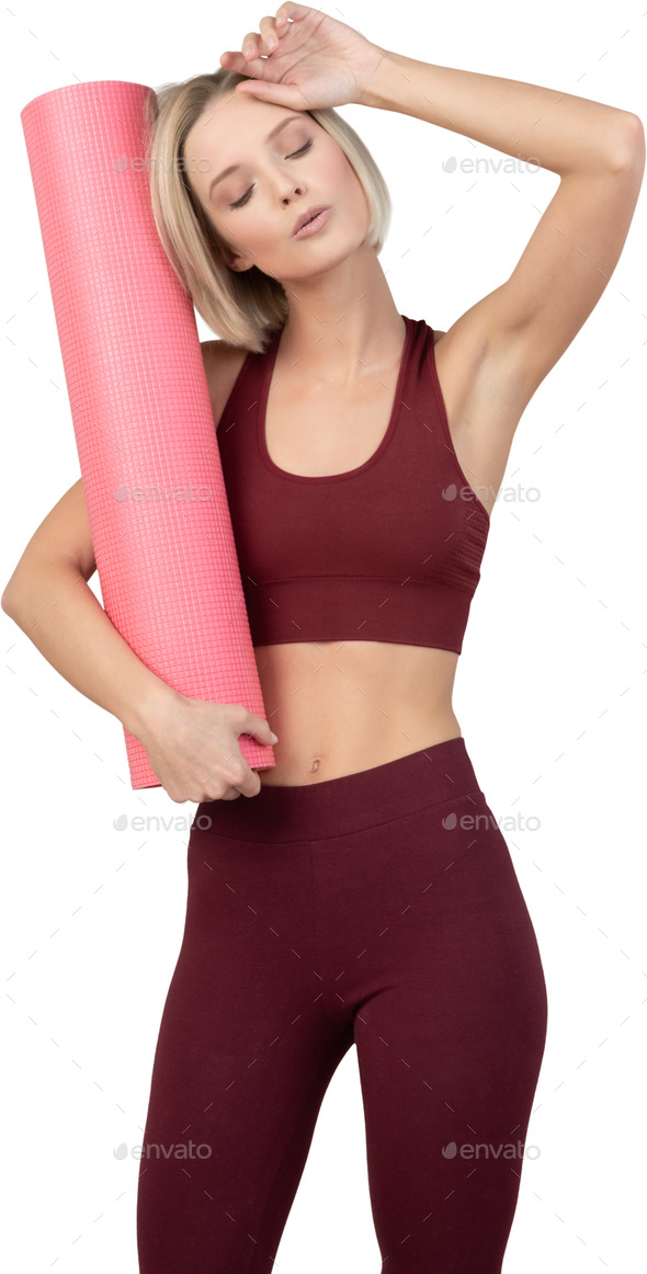 a young woman is holding a pink foam rolling mat