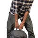 a man is kneeling down with a backpack - PhotoDune Item for Sale