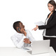 a man sitting at a desk talking on a cell phone and a woman standing next - PhotoDune Item for Sale