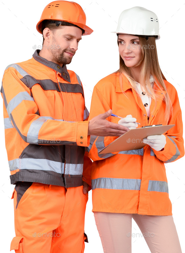 a man and a woman in orange safety gear looking at a clipboard - Stock Photo - Images
