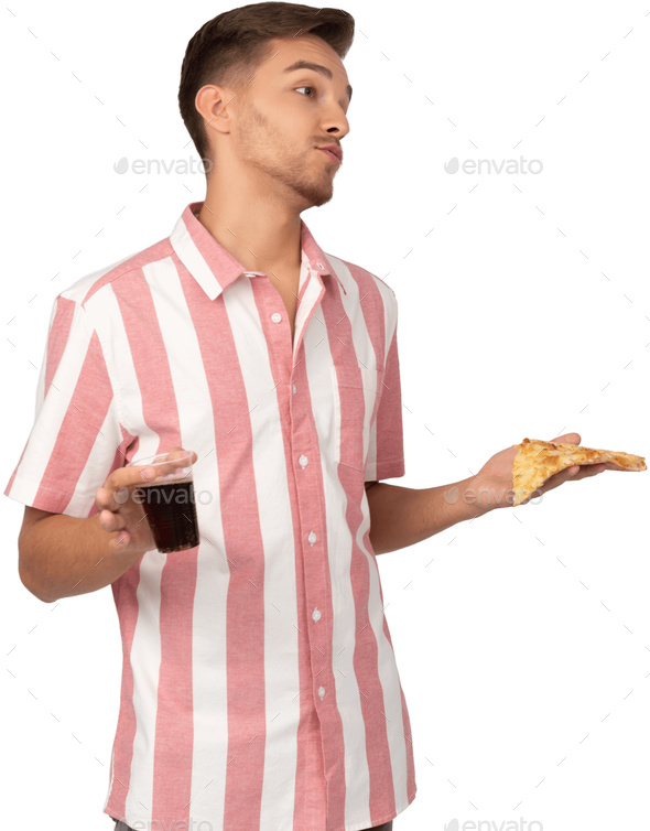 a man in a pink and white striped shirt eating pizza and holding a drink - Stock Photo - Images