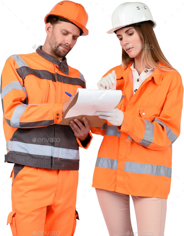 a man and woman in orange safety gear looking at a piece of paper - Stock Photo - Images