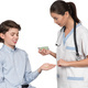 a boy and a girl in nurses uniforms looking at a piece of soap - PhotoDune Item for Sale
