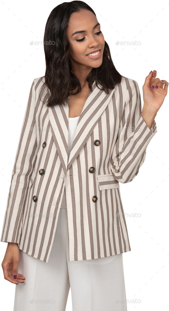 a model in a striped coat and white pants - Stock Photo - Images