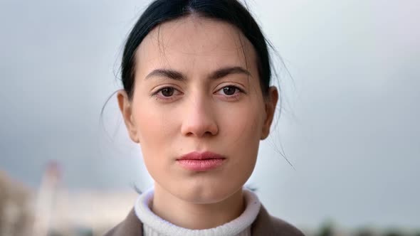 Closeup Face of Asian Woman with Perfect Skin Posing at City Street alt