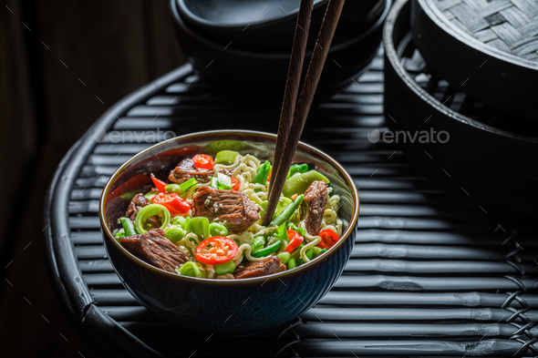 Hot asian noodle with vegetables and beef. Asian cuisine.