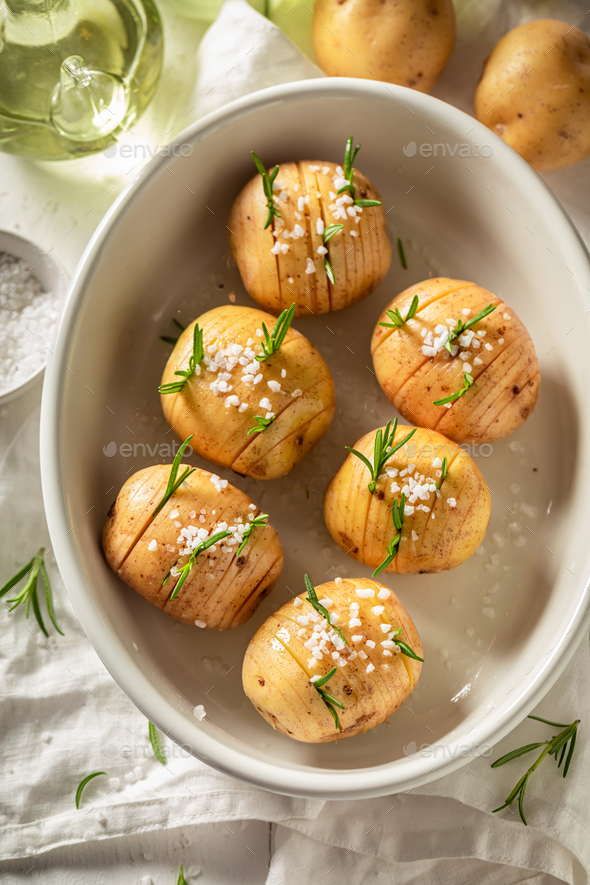 Delicious baked potatoes with fresh herbs and salt. Swedish cuisine.