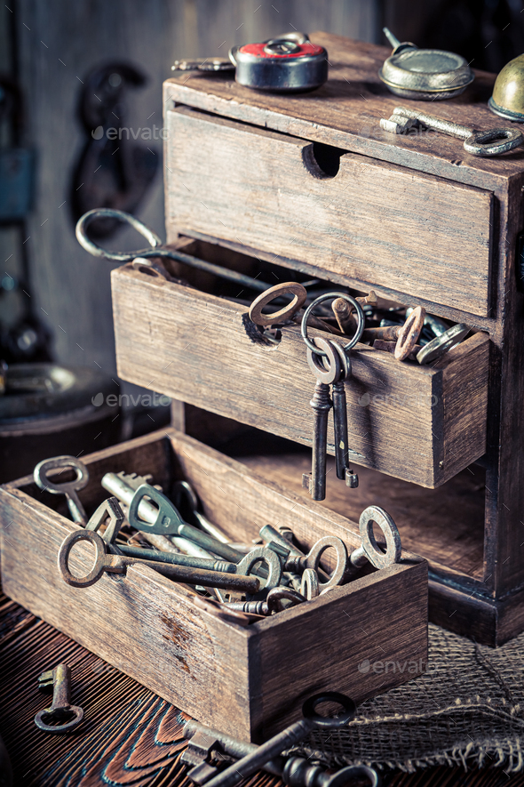 Old locksmiths workshop with locks and tools. Ancient locksmiths workshop.
