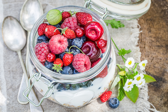 Fit food. Healthy muesli with berries and yogurt.