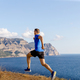 male runner run mountain trail on seashore - PhotoDune Item for Sale