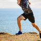 male athlete start running on sea background - PhotoDune Item for Sale