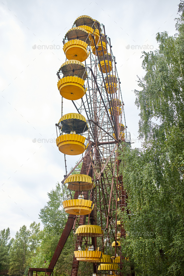 Old abandoned Ferris wheel in the amusement park in the ghost town Pripyat Ukraine - Stock Photo - Images